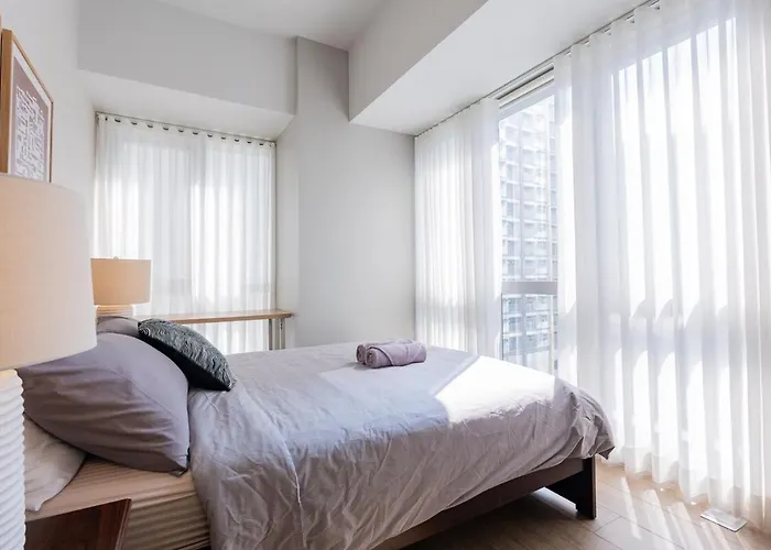 Uptown Bgc Views - Spacious 1br - Sofabed - Washer Manila