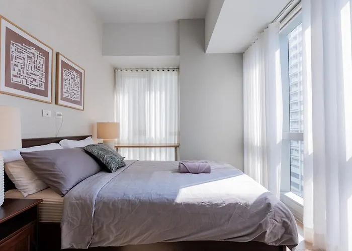Uptown Bgc Views - Spacious 1br - Sofabed - Washer Apartahotel Manila